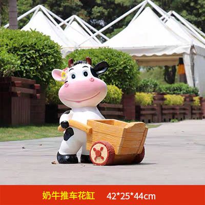 動(dòng)物園一只推車(chē)的玻璃鋼牛雕塑